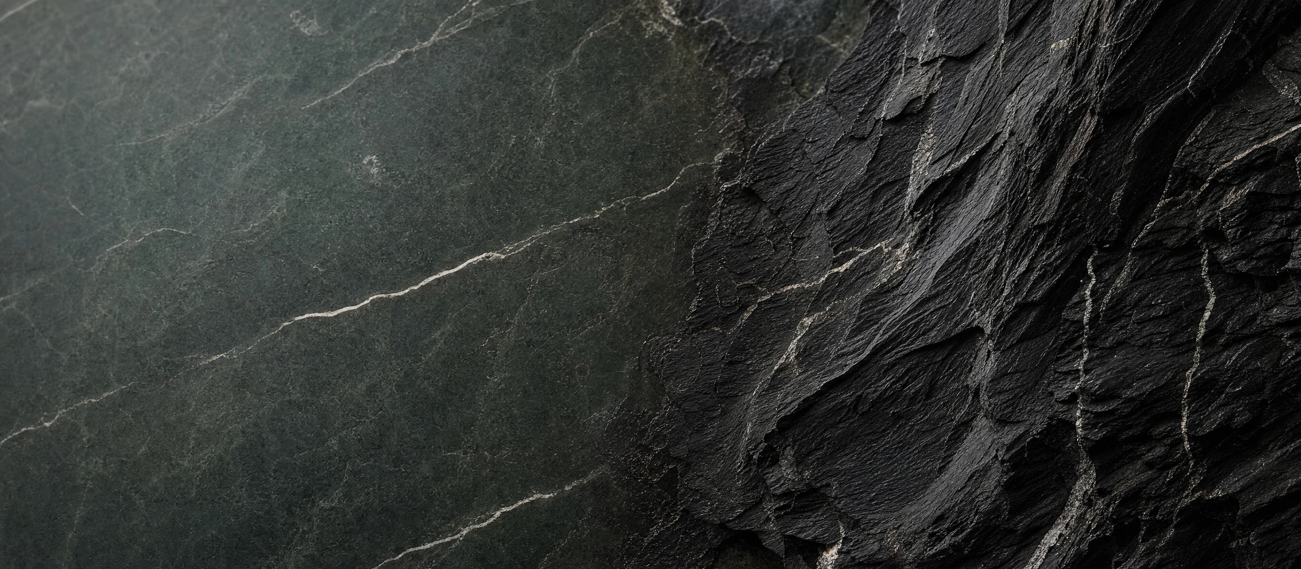 Abstract dark veined stone material.